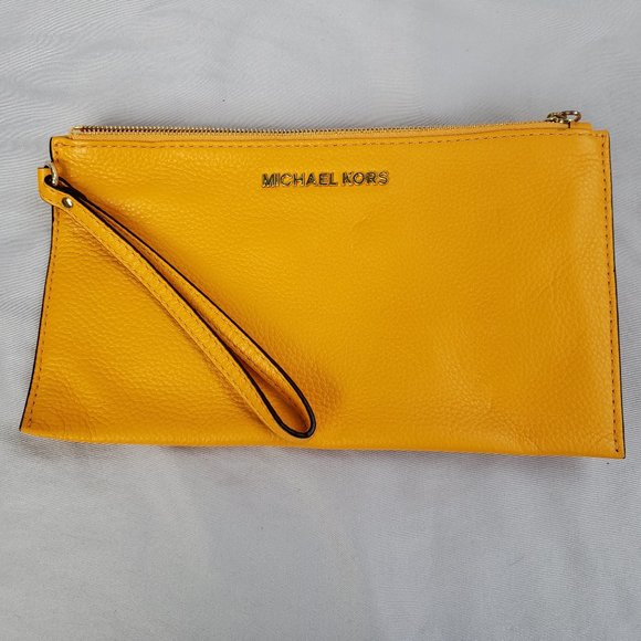 Michael Kors Handbags - Michael Kors bright orange /yellow wristlet wallet